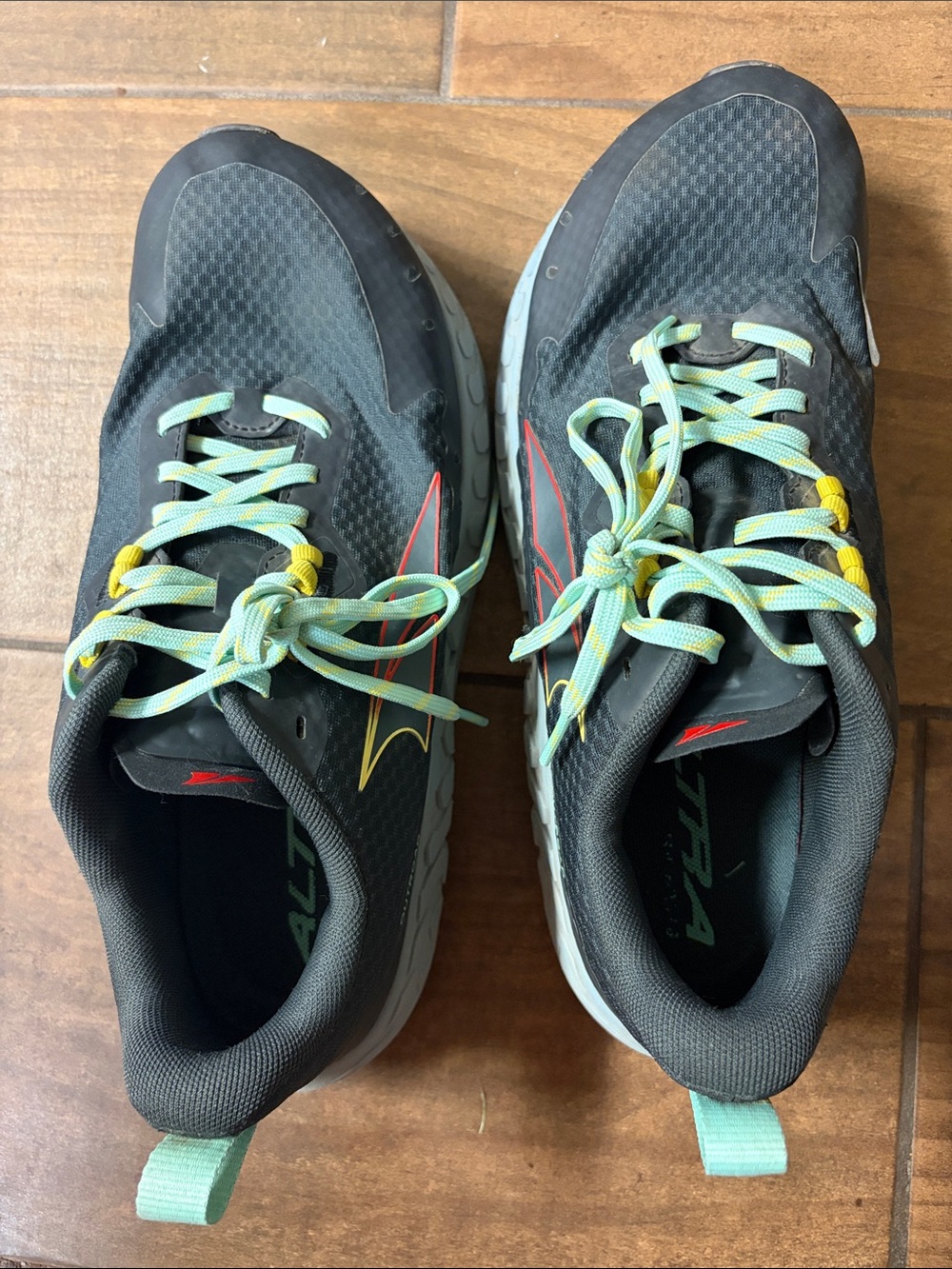 Altra Black Athletic Shoes with Mint Laces and Yellow Eyelets